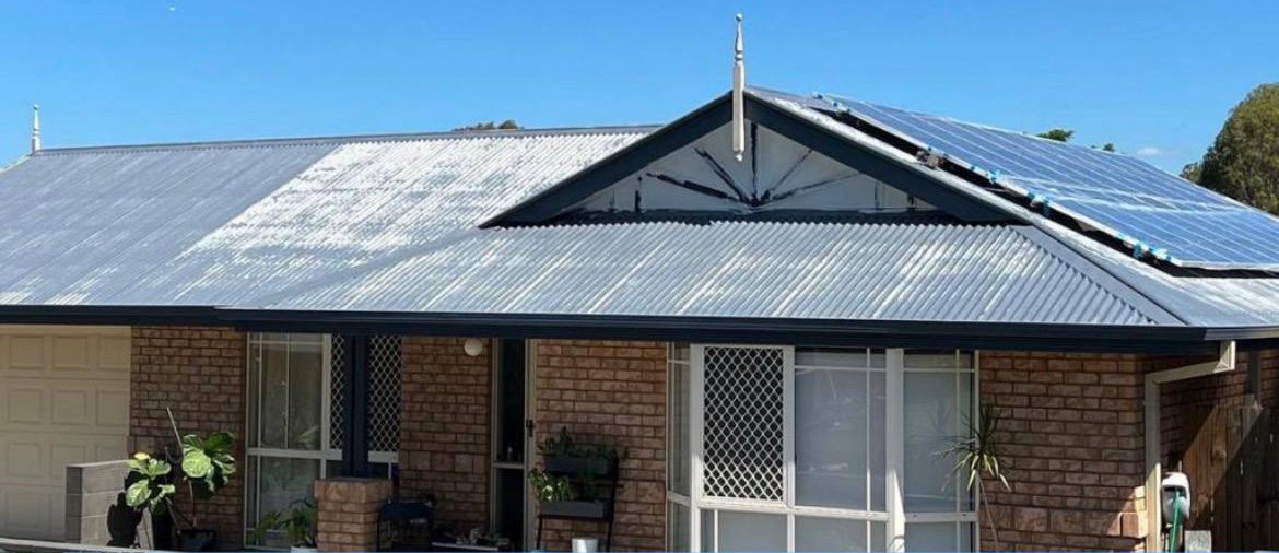 Before: Metal roof